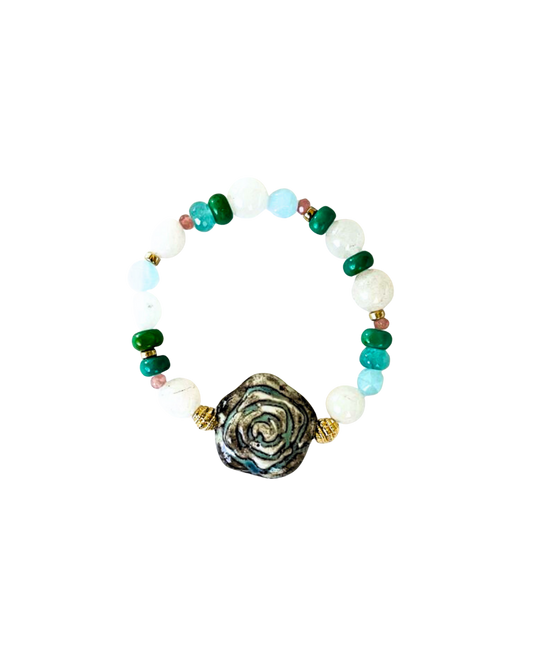 PULSERA PIEDRAS Y DIJE DE FLOR