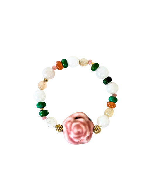PULSERA DE PIEDRAS Y DIJE DE FLOR